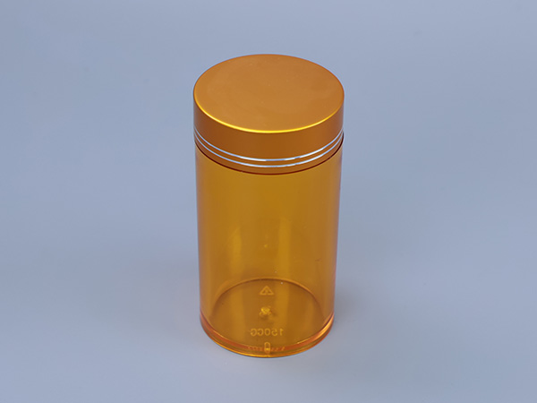 Amber Clear Plastic Bottle with Gold Cap